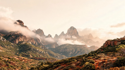 Aesthetic mountain wallpaper 4K featuring a serene alpine landscape with warm earth tones, soft mist, and a peaceful natural atmosphere [9240691474581]